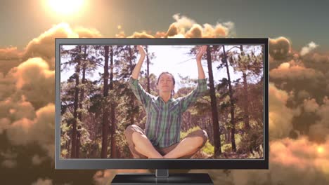 Computer-screen-showing-yoga-in-the-nature-