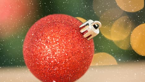 Falling-snow-and-Christmas-bauble