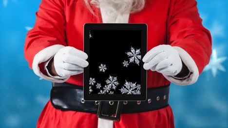 Der-Weihnachtsmann-Benutzt-Ein-Tablet-Mit-Schneeflocken