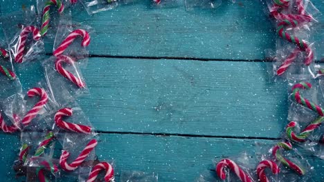 Falling-snow-with-Christmas-candy-decoration