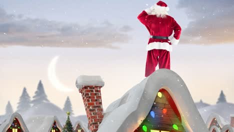 Weihnachtsmann-Auf-Dem-Dach-Eines-Geschmückten-Hauses-In-Winterlandschaft-Kombiniert-Mit-Fallendem-Schnee
