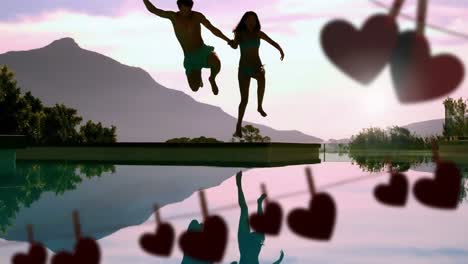 Happy-couple-jumping-in-a-lake-and-hearts-for-valentine-day