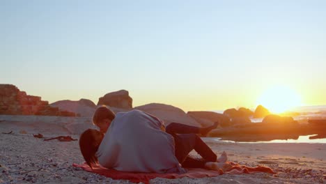 Romantic-couple-kissing-on-the-beach-4k