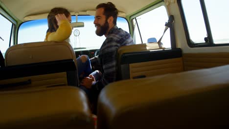Young-couple-interacting-with-each-other-in-the-van-4k