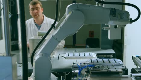 Robotic-engineers-working-in-warehouse-4k