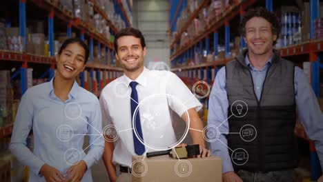 Excited-workers-in-a-warehouse-holding-box