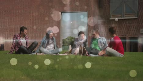 Friends-relaxing-on-grass-with-bubble-light-animation-