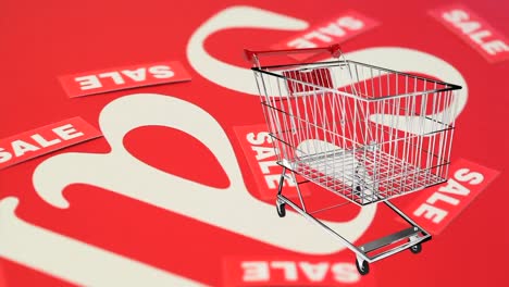 shopping-cart-rotating-on-turning-background-with-sale-