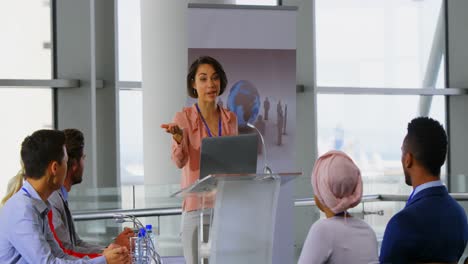 Female-speaker-speaking-in-a-business-seminar-4k