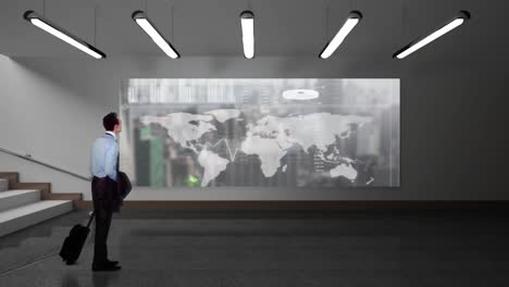Businessman-looking-at-a-screen-showing-a-earth-map-with-data