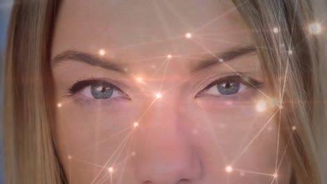 Light-connections-moving-on-a-background-with-a-women-opening-her-eyes