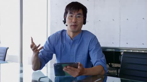 Front-view-of-Asian-male-executive-interacting-in-the-office-4k