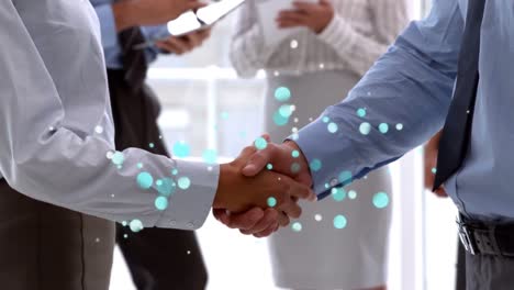 Side-view-of-businessmen-shaking-hands-with-sparkling-blue-light-bubbles-in-foreground