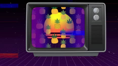 Alter-Fernseher-Mit-Ananas-Und-Sonnenuntergang-Auf-Dem-Bildschirm
