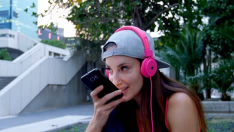 Female-street-dancer-talking-on-phone-4k