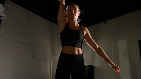 Female-athlete-exercising-with-kettlebell-4k