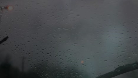 Animation-of-windshield-on-stormy-road-trip-