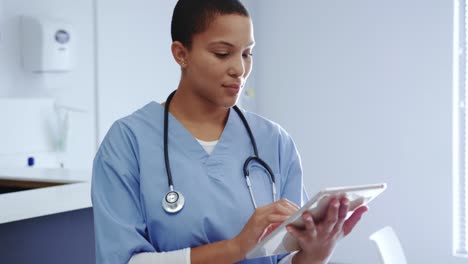 Female-doctor-using-digital-tablet-in-hospital-4k