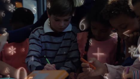Schoolchildren-writing-together-while-numbers-and-symbols-move