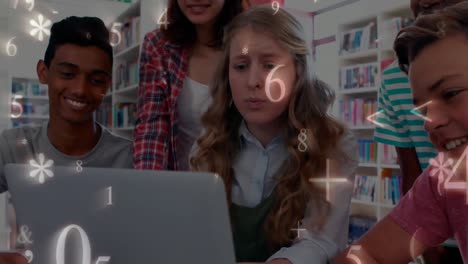 Students-looking-at-laptop-screen-together-while-numbers-and-symbols-move