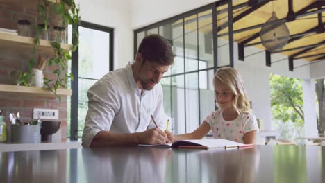 Father-helping-her-daughter-in-homework-at-home-4k