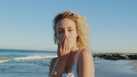 Young-woman-blowing-kiss-to-camera-4k