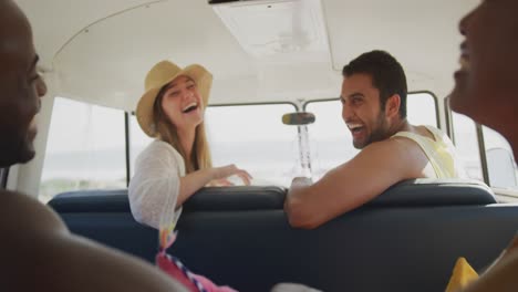 Young-adult-couple-talking-in-a-camper-van-4k