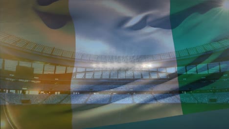 Bandera-Ondeando-Frente-A-Un-Estadio