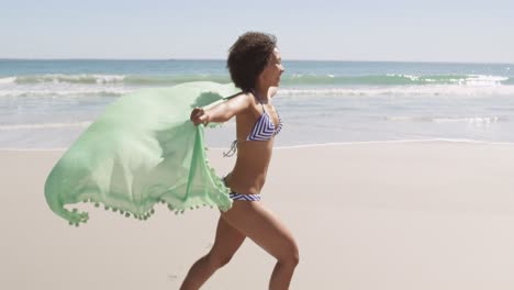 Young-woman-running-at-the-beach-4k