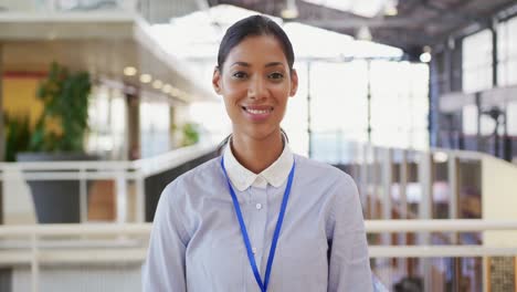 Portrait-of-young-businesswoman-at-a-conference