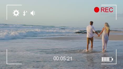 Ein-Paar-Am-Strand-Mit-Einer-Digitalkamera-4k-Filmen