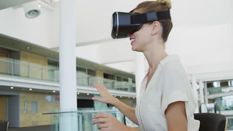 Businesswoman-using-VR-in-a-modern-office