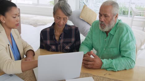 Mature-couple-with-advisor-at-home