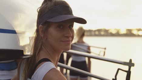 Portrait-of-female-rower-by-a-river