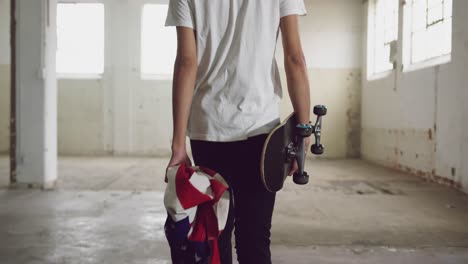 Fashionable-young-man-in-an-abandoned-warehouse
