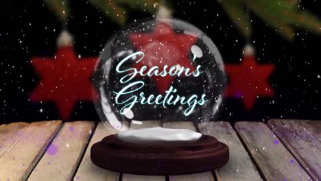 Seasons-Greetings-on-a-snow-globe