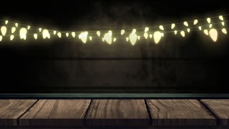 Glowing-string-of-fairy-lights-on-brick-wall