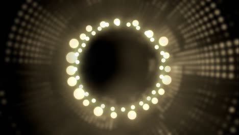 Glowing-circle-of-fairy-lights-on-grey-background