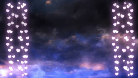 Cadenas-Brillantes-De-Luces-De-Colores-Sobre-Fondo-De-Nubes