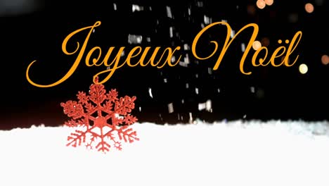 Joyeux-Noël-über-Schneefall-Geschrieben