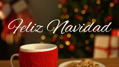 Feliz-Navidad-written-over-mug-and-plate-with-cookies