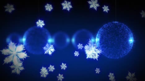 Baubles-and-snow-falling-on-blue-background