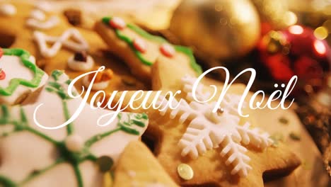 Joyeux-NoÃ«l-written-over-Christmas-cookies