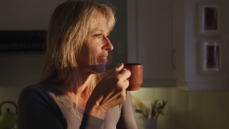 Woman-drinking-coffee-at-home