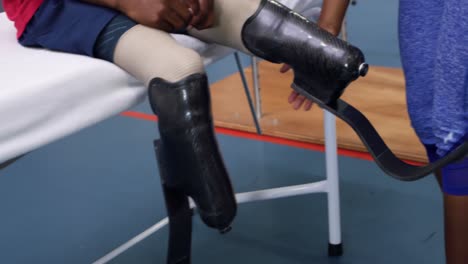Man-exercising-with-prosthetic-legs