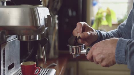 Senior-man-making-coffee-at-home
