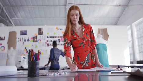 Caucasian-woman-working-in-fashion-office