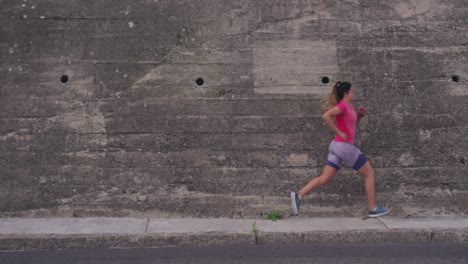 Caucasian-woman-running-on-the-street
