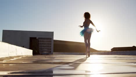 Ballet-dancer-practicing-on-rooftop-