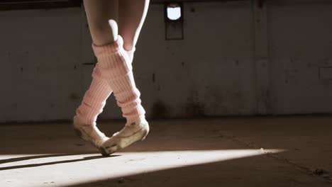 Female-dancer-in-an-empty-warehouse